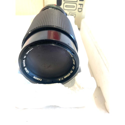 158 - Boxed canon 70-210/4.0 lens and a rmc tokina