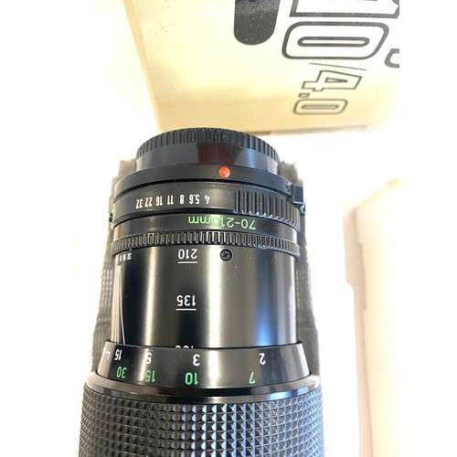 158 - Boxed canon 70-210/4.0 lens and a rmc tokina