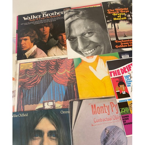 84 - Selection of vinyls to include The Police, Monty Python, The Drifters, Elvis, etc