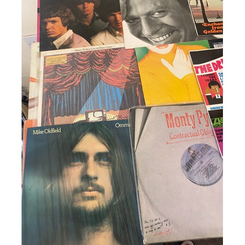 84 - Selection of vinyls to include The Police, Monty Python, The Drifters, Elvis, etc