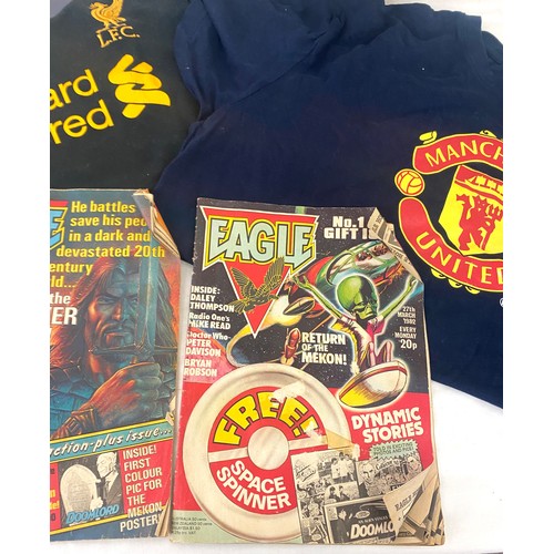 184 - Liverpool and Manchester United t shirts, American football and 2 vintage Eagle comics