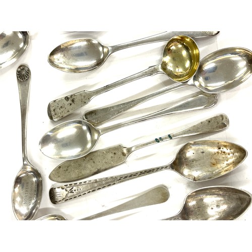 631 - 11 Silver spoons, 1 Butter knife, Edinburgh, Newcastle, Sheffield marks, total weight approximately ... 