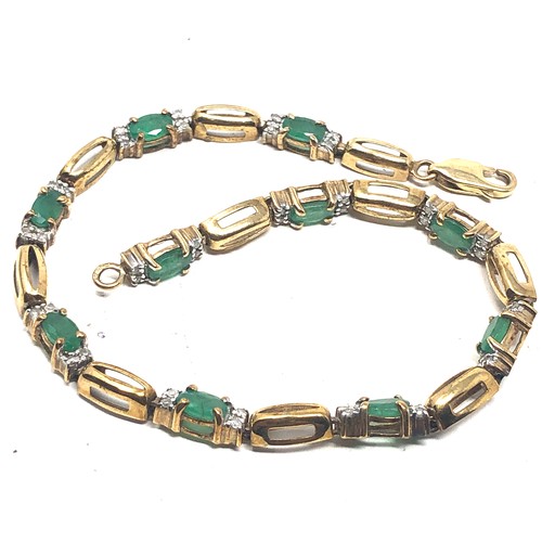 157 - 9ct gold emerald & diamond tennis bracelet (5.8g)