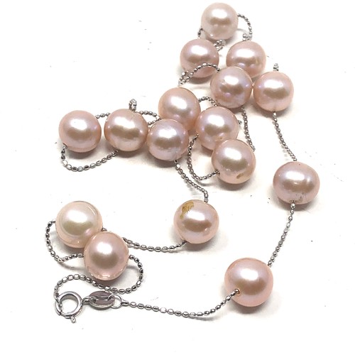 179 - 18ct white gold pearl station necklace (13.1g)