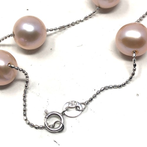 179 - 18ct white gold pearl station necklace (13.1g)