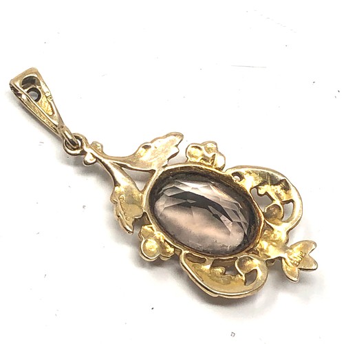 161 - 9ct gold vintage smoky quartz ornate floral pendant (4.1g)