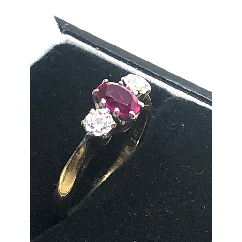 166 - 18ct gold synthethic ruby & diamond three stone dress ring (2.8g)