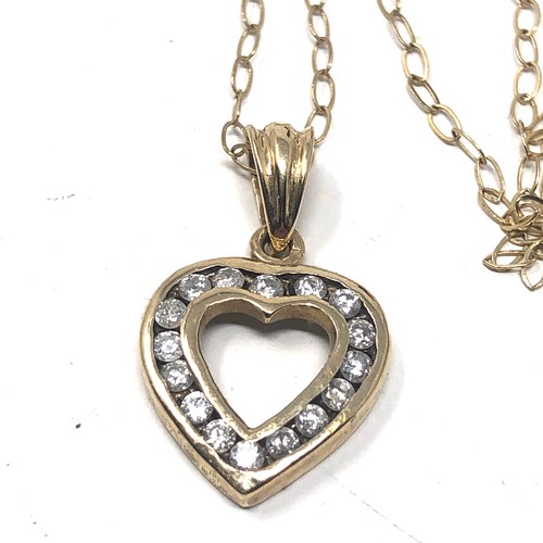 145 - 9ct gold heart diamond detail pendant necklace (1.5g)