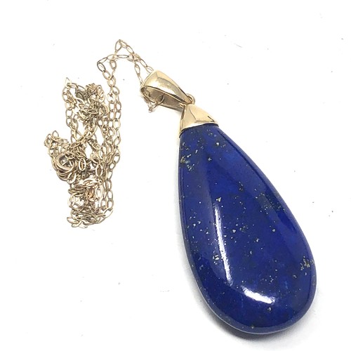 136 - 9ct gold lapis lazuli pendant necklace (10.2g)