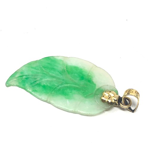 149 - 14ct gold bail jade pendant (2.5g)