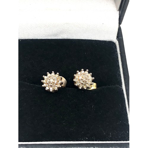 154 - 9ct gold diamond stud earrings (1g)