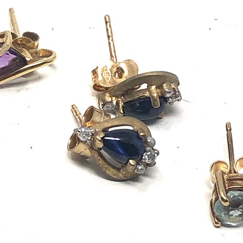 138 - 3 x 9ct gold earrings including topaz, sapphire and amethyst (4.3g)