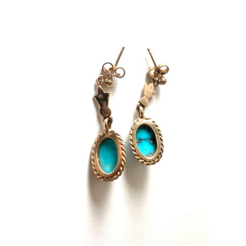 477 - 9ct gold turquoise earrings. Weight approx 3.4 grams Drop 2.9 cm