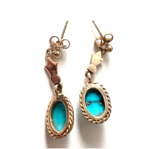 477 - 9ct gold turquoise earrings. Weight approx 3.4 grams Drop 2.9 cm