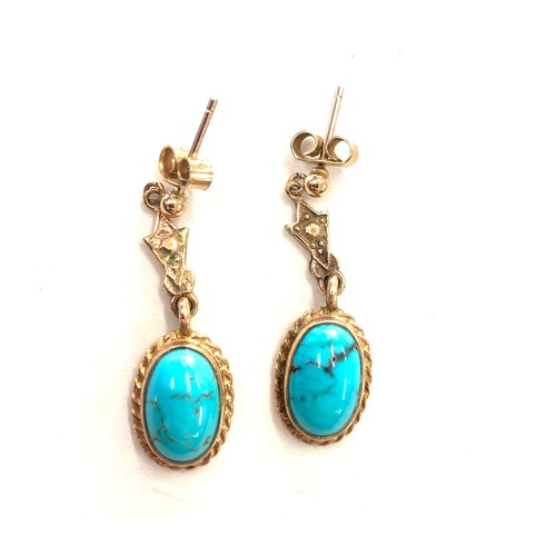 477 - 9ct gold turquoise earrings. Weight approx 3.4 grams Drop 2.9 cm