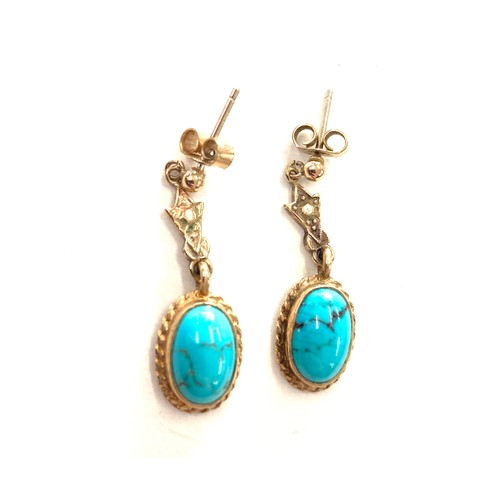 477 - 9ct gold turquoise earrings. Weight approx 3.4 grams Drop 2.9 cm