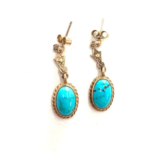 477 - 9ct gold turquoise earrings. Weight approx 3.4 grams Drop 2.9 cm