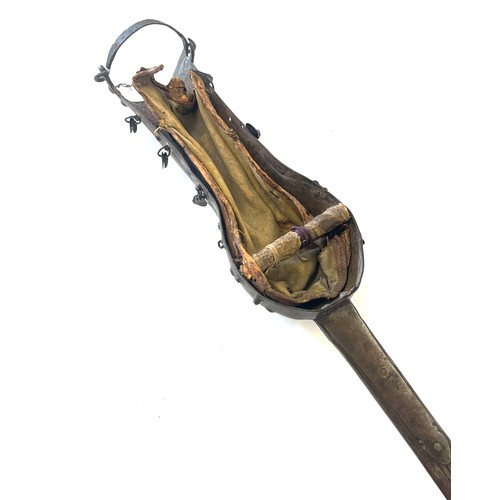 99B - An antique 19th century pata, patta sword, originating from the Indian subcontinent, with a gauntlet... 