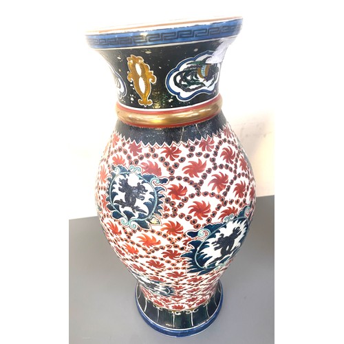 35 - A pair of hand painted oriental vases marks to base measures approx 14 inches high