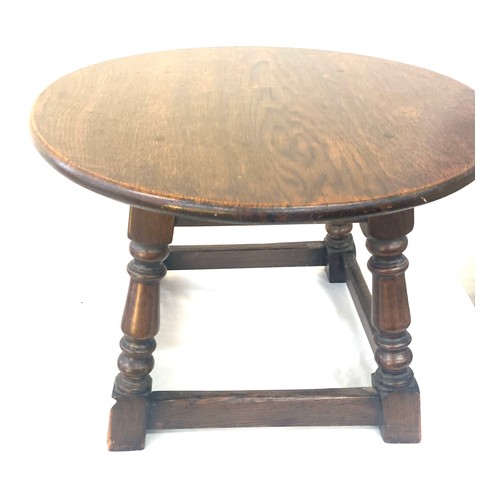 390 - Antique oak table measures approx 15 inches high by 20 inches diameter