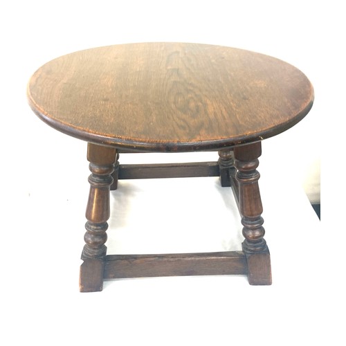 390 - Antique oak table measures approx 15 inches high by 20 inches diameter