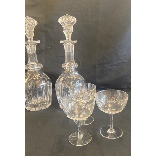 88 - Six matching glasses and two glass matching decanters with their stoppers- decanters measure approx ... 