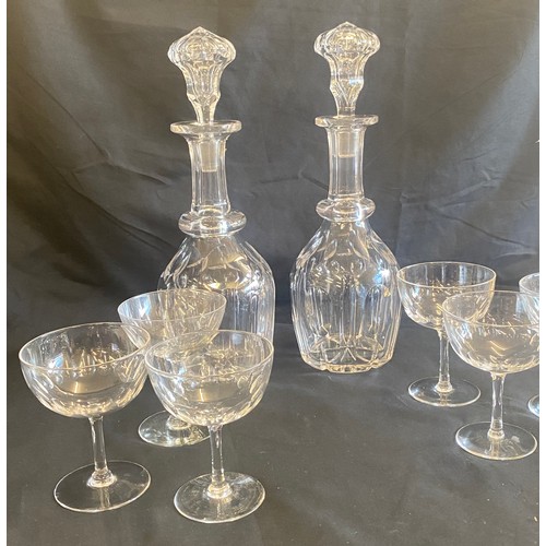 88 - Six matching glasses and two glass matching decanters with their stoppers- decanters measure approx ... 