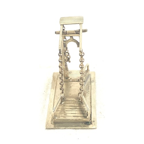 441 - Miniature Silver mechanical piece releasing a draw bridge, hallmarked