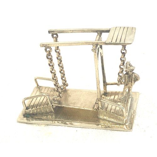 441 - Miniature Silver mechanical piece releasing a draw bridge, hallmarked