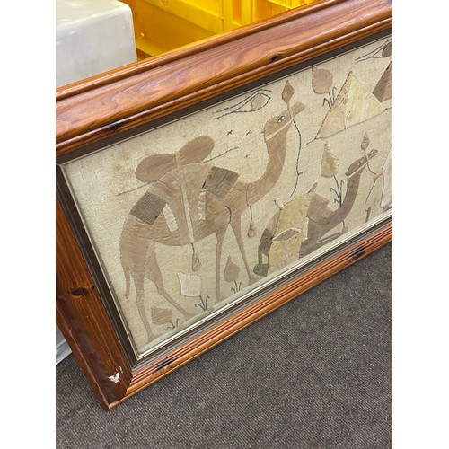 124 - Framed Egyptian canvas frame measures approx 48 inches by 22.5 inches