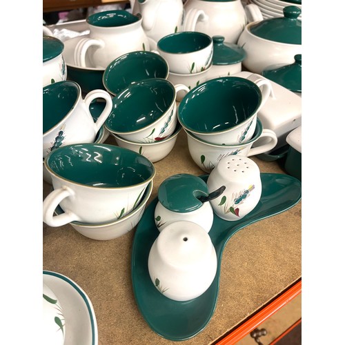 392 - Large selection of Denby Ware green wheat pottery to include part dinner and tea services approximat... 