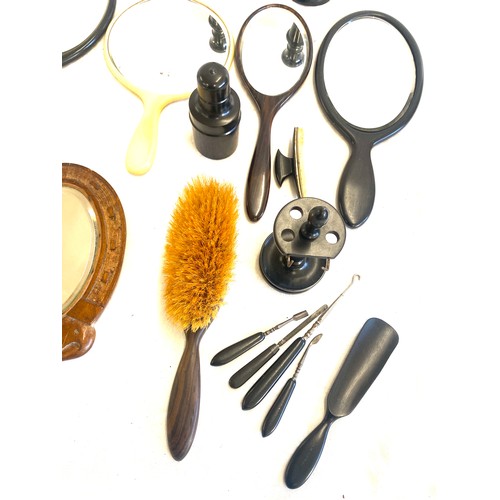 146 - Selection of vanity mirrors, Ebony dressing table set, manicure set etc