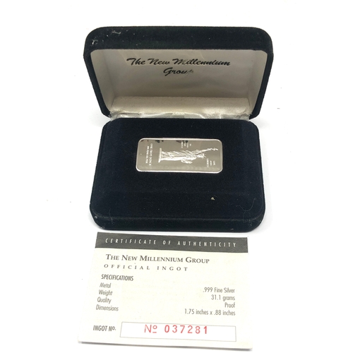 8 - Boxed the new millennium group official 1oz 999.silver ingot with coa