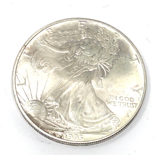 570 - 1995 1oz fine silver Liberty Dollar