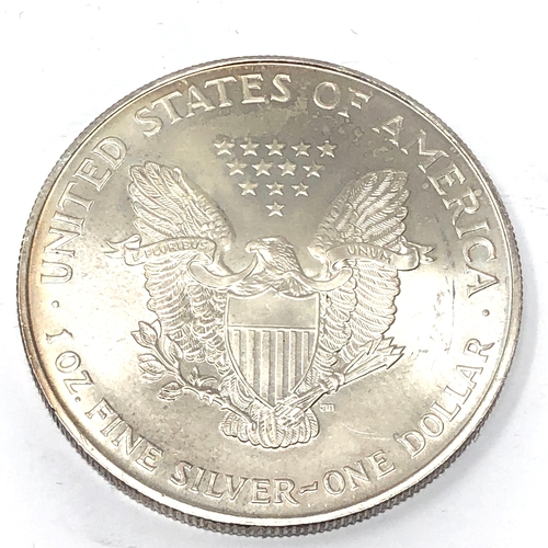 570 - 1995 1oz fine silver Liberty Dollar