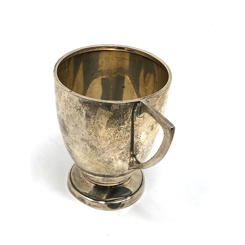 23 - Silver Christening mug Birmingham silver hallmarks base is out of shape