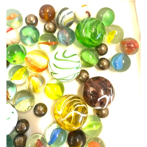 105 - Selection vintage marbles various sizes and detailing