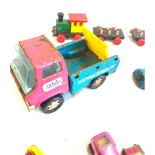 144 - Selection vintage Dinky and other tin toys to include Tri-ang mini highway, Dinky delivery service, ... 