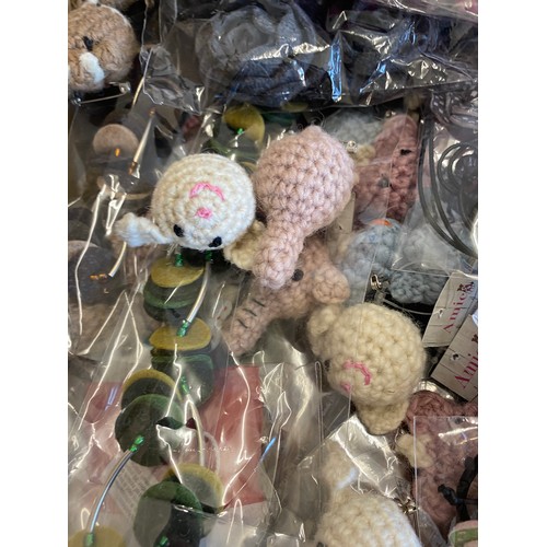 282 - Large selection of assorted new felt hair clips, knitted brooch / badges etc (3 boxes in total)