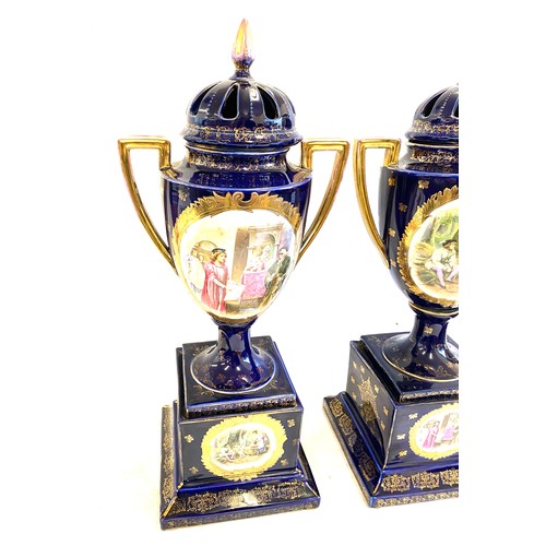 89 - Pair Victoria Carlsbad Austria hand painted urn lidded urns on plinths, Height 22 inches