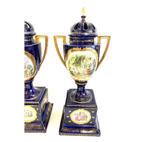 89 - Pair Victoria Carlsbad Austria hand painted urn lidded urns on plinths, Height 22 inches