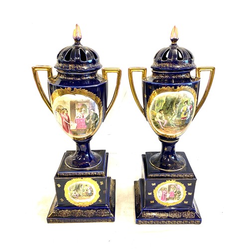 89 - Pair Victoria Carlsbad Austria hand painted urn lidded urns on plinths, Height 22 inches