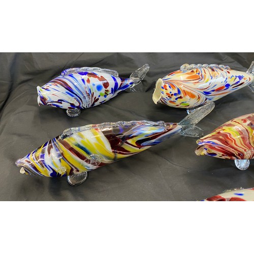 74 - Selection of five Murano glass fish