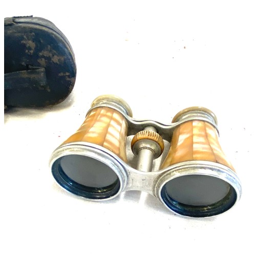 430 - Cased Mother of pearl extending binoculars