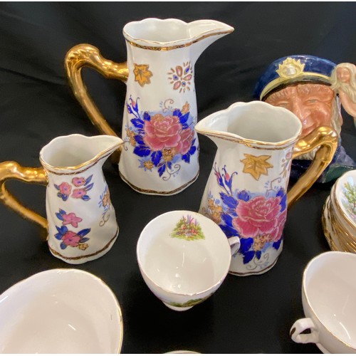 77 - Selection of assorted pottery includes Toby Jug, Graduated jugs, part tea service etc