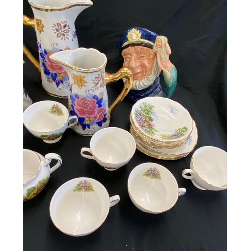 77 - Selection of assorted pottery includes Toby Jug, Graduated jugs, part tea service etc