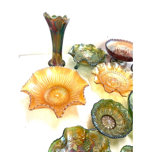 215 - Selection of various pieces of carnival glass to include vases, posy bowls, bowls etc