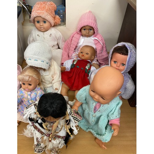 251 - Large selection of assorted dolls includes 2006 zapf creations doll etc