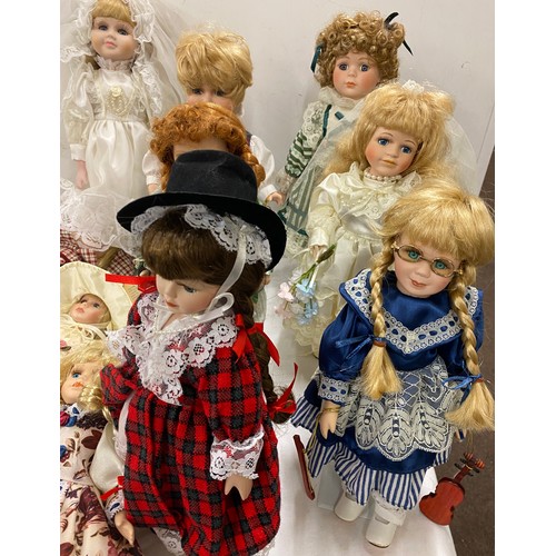 257 - Selection of vintage pot dolls, all with stands, some musical