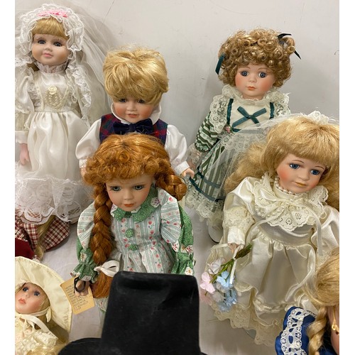 257 - Selection of vintage pot dolls, all with stands, some musical